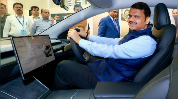 CM Fadnavis explores Tesla model Y features
