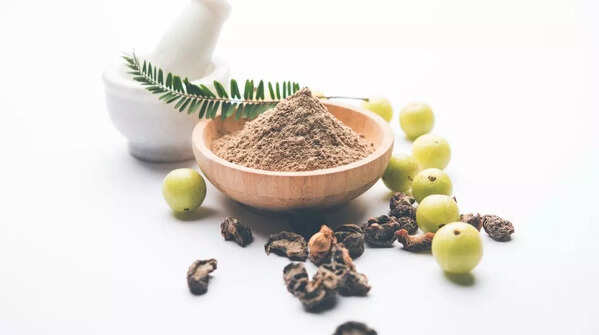 Herbal powder (e.g. brahmi, bhringraj, amla) mask