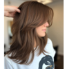 Curtain bangs with medium-length layers