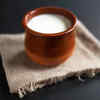 Why does curd become sticky?