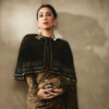 Full-sleeve blouse with a statement cape