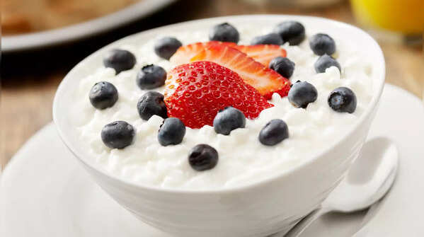Mixing curd with fruits