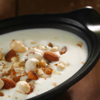 Hung curd bowl with walnuts, honey, and roasted makhana