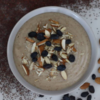 Warm ragi porridge with chopped almonds and dates