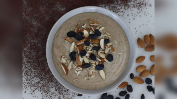 Warm ragi porridge with chopped almonds and dates