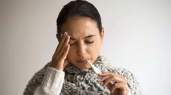 Mild fever and discomfort
