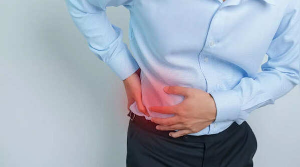 The pain is dull and persistent, and it does not improve with movement or rest