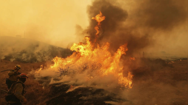Firefighters continue to contain the flames