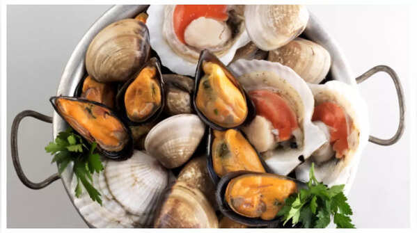 Limit consumption of high purine containing foods