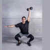  Squat into shoulder press (Using light weights or bottles)