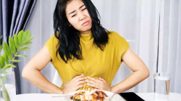 Feeling full quickly, even after having small meals