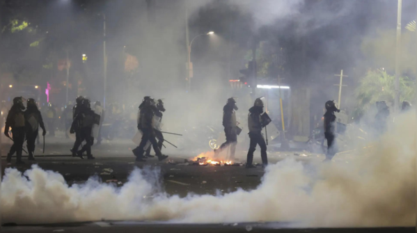 Protesters torched buildings