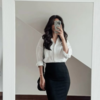 Tucked into a skirt