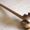 Madani: the wooden churner of patience