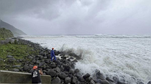 Waves crash ashore