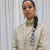 Off-white sherwani jacket, turtleneck, along with soft tones