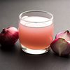 How can onion juice help with hair growth?