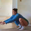 Kneeling to a low squat