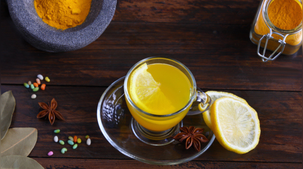 Lemon water with a tiny pinch of haldi