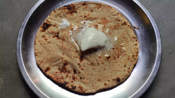 White butter and bajra roti