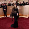 Sheer black dress and chocolate hair: BLACKPINK's Lisa debuts stunning new  look at Golden Globes 2026 - The Times of India