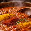 Add tomatoes and spices