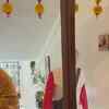 Article image for: <i class="tbold">tanusree shankar</i> hosts Jhumpa Lahiri and her husband at her home on Saraswati Puja