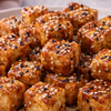 Tofu cubes with sesame glaze