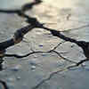 Foundation damage or widening slab cracks