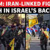 Article image for: 'Resistance Only Option': Iran-Allied Fighters Hold Stunning <i class="tbold">parade</i> Near Israel Amid US War Threat