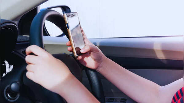 Using a mobile phone while driving is strictly penalised