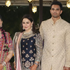 The bride is keeping it elegant in ivory