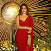 Rhea Chakraborty turns heads in red at reception