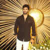 Adivi Sesh dons a black and white outfit