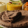 Article image for: Peanut and sesame chutney with millet <i class="tbold">roti</i>
