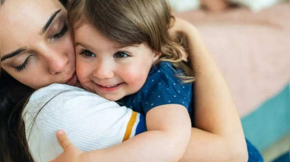 The emotional meaning behind toddler hugs and cuddles