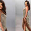 Priyanka Chopra ditches Dior for 'liquid gold' look at Vanity Fair party,  Nick Jonas complements her perfectly | - The Times of India
