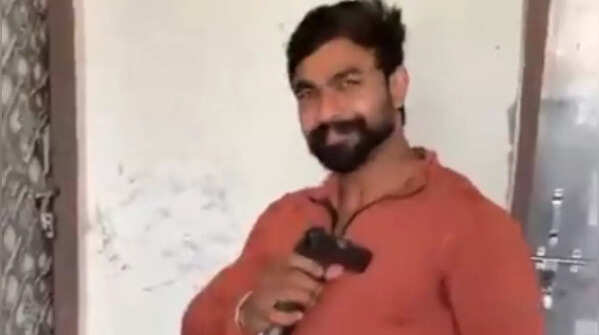Gun placed on chest before shot fired