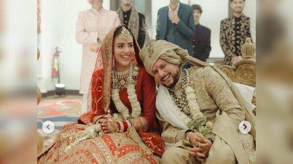 With wife Vanshika Chadha