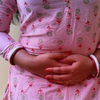 When someone feels the urge to urinate but passes very little, what are the most common underlying causes doctors usually see?
