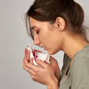 What are the early symptoms of TB that people often ignore or mistake for something less serious?