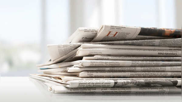 Old stack of newspapers and magazines