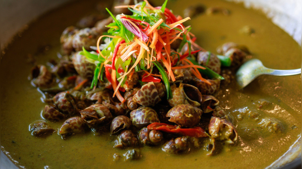 Snails cooked with coconut and spices