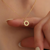 Delicate gold pendants and chain