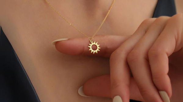 Delicate gold pendants and chain