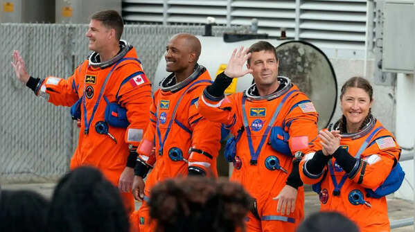 Artemis II astronauts embark on historic Nasa mission as the full moon glows