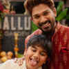 Adorable father-son moment in traditional attire