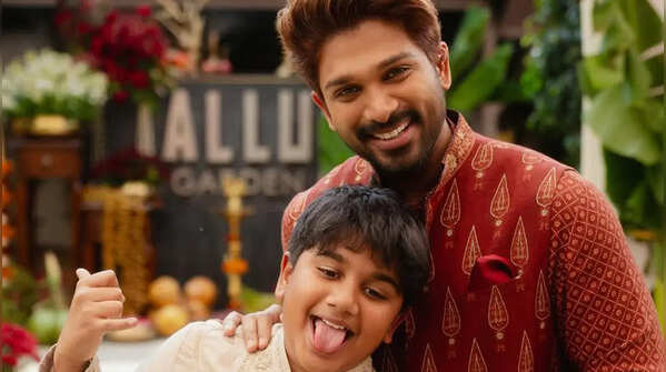 Adorable father-son moment in traditional attire