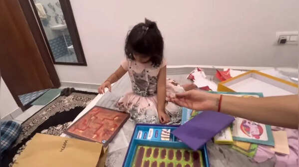 Rajeev carries presents for Ziana