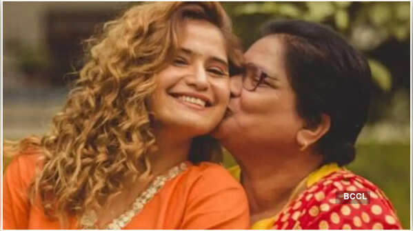 On her mother adopting her